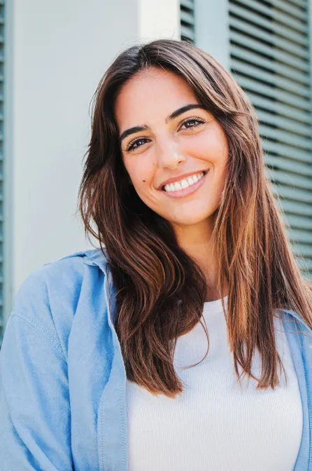 Smiling woman in a blue shirt